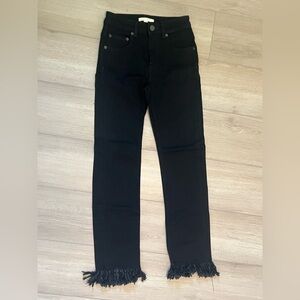 The pants are new, high-waisted, black.